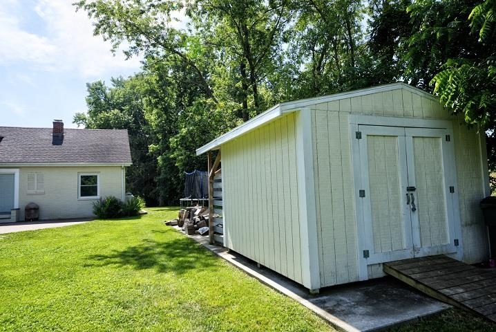 670 Rockfish Road Waynesboro, VA 22980 - Photo 24 of 58 a backyard of a house with yard barbeque oven and outdoor seating