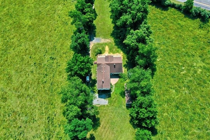 670 Rockfish Road Waynesboro, VA 22980 - Photo 27 of 58 an aerial view of a house with a yard and large trees