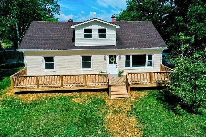 670 Rockfish Road Waynesboro, VA 22980 - Photo 29 of 58 a view of a house with a yard and wooden fence