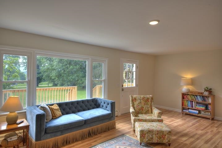670 Rockfish Road Waynesboro, VA 22980 - Photo 34 of 58 a living room with furniture and a large window