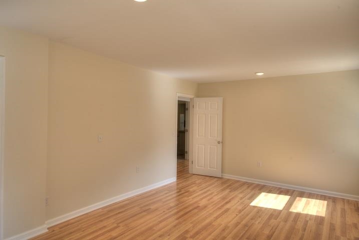 670 Rockfish Road Waynesboro, VA 22980 - Photo 40 of 58 a view of an empty room and wooden floor