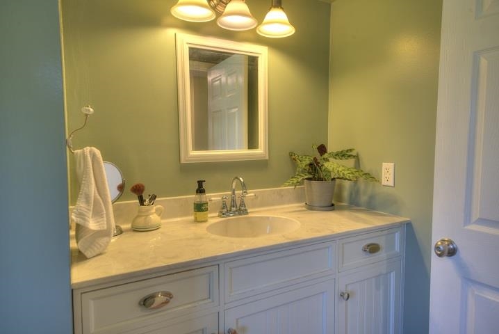 670 Rockfish Road Waynesboro, VA 22980 - Photo 44 of 58 a bathroom with a sink and a mirror