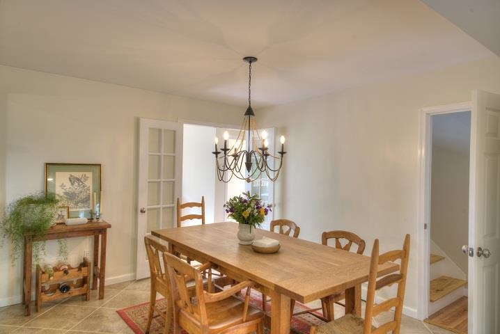670 Rockfish Road Waynesboro, VA 22980 - Photo 5 of 58 a view of a dining room with furniture and chandelier