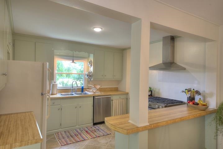 670 Rockfish Road Waynesboro, VA 22980 - Photo 6 of 58 a kitchen with a sink and cabinets