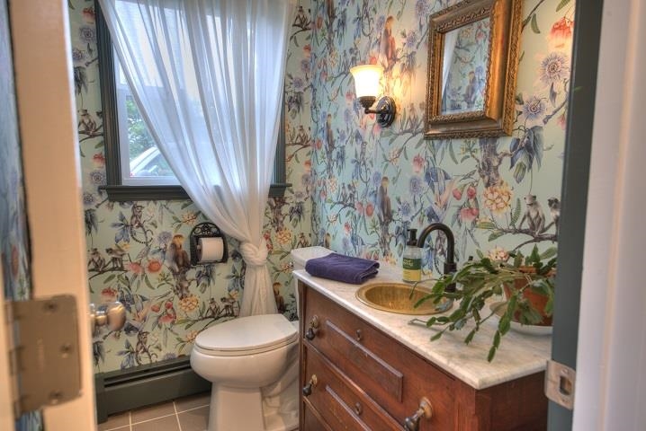 670 Rockfish Road Waynesboro, VA 22980 - Photo 10 of 58 a bathroom with a sink a toilet and a window