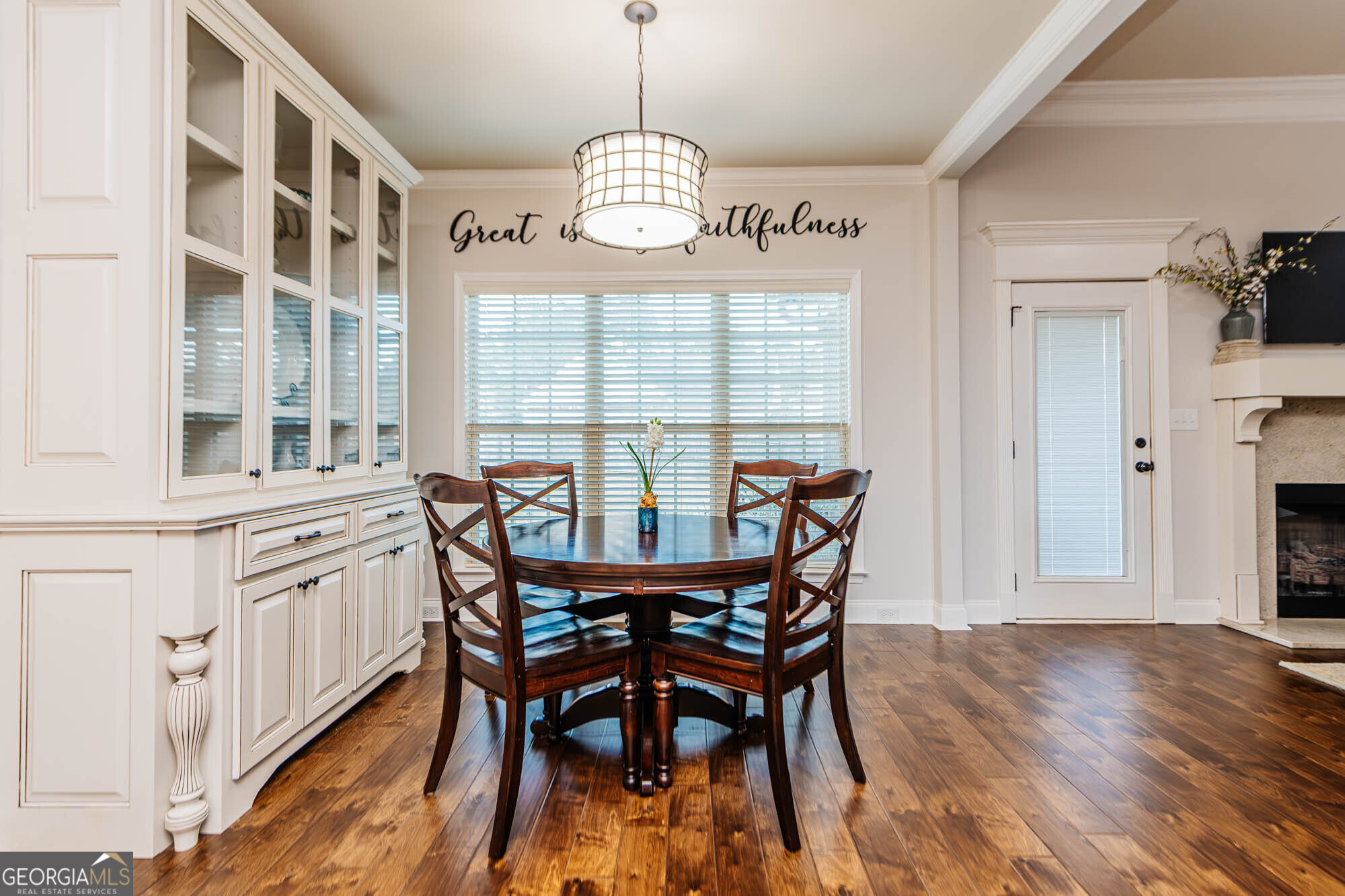 112 Bainbridge Lane Perry, GA 31069 - Photo 12 of 34 a view of a dining room with furniture window and wooden floor