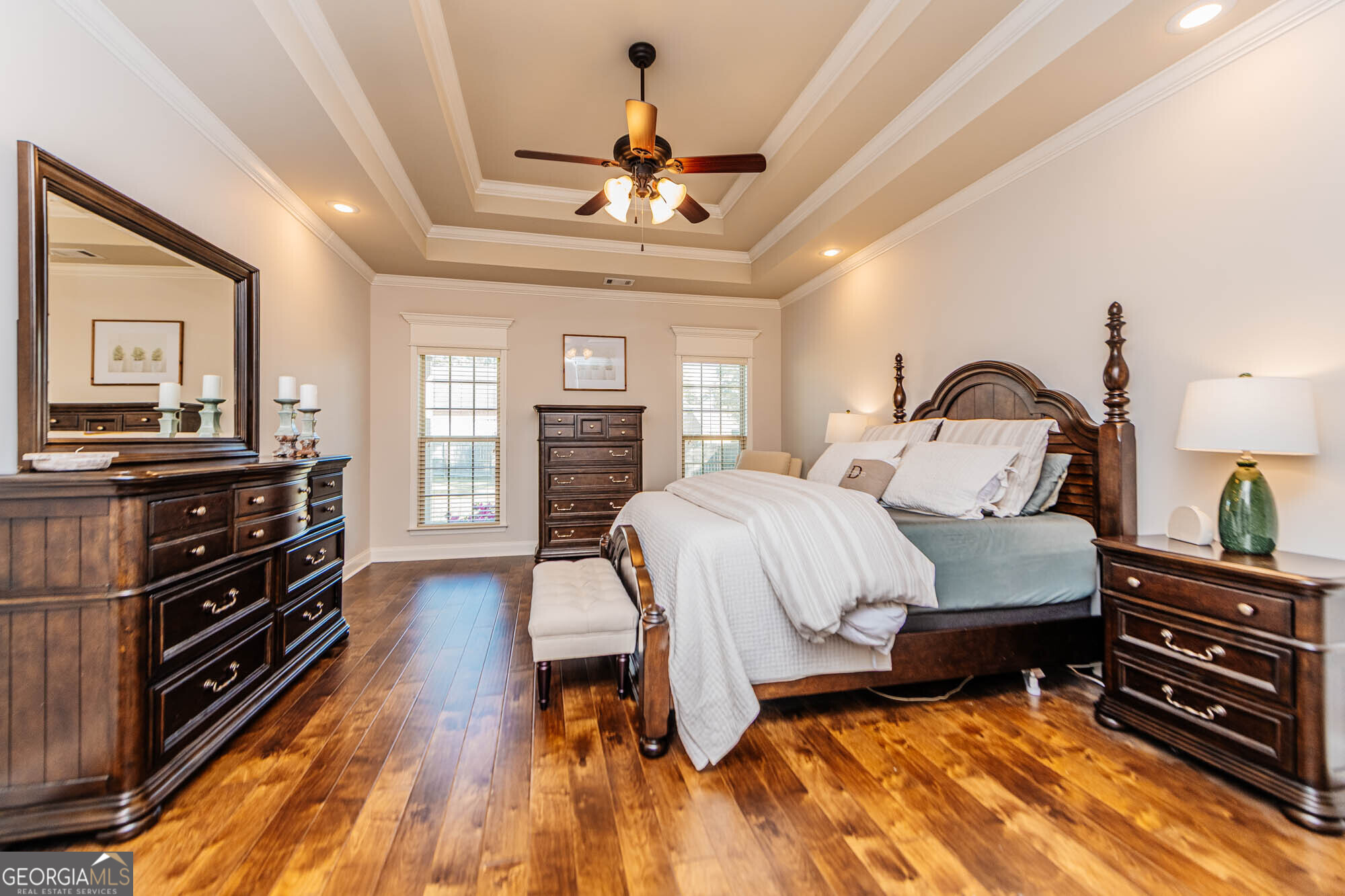 112 Bainbridge Lane Perry, GA 31069 - Photo 16 of 34 a bedroom with a bed and wooden floor