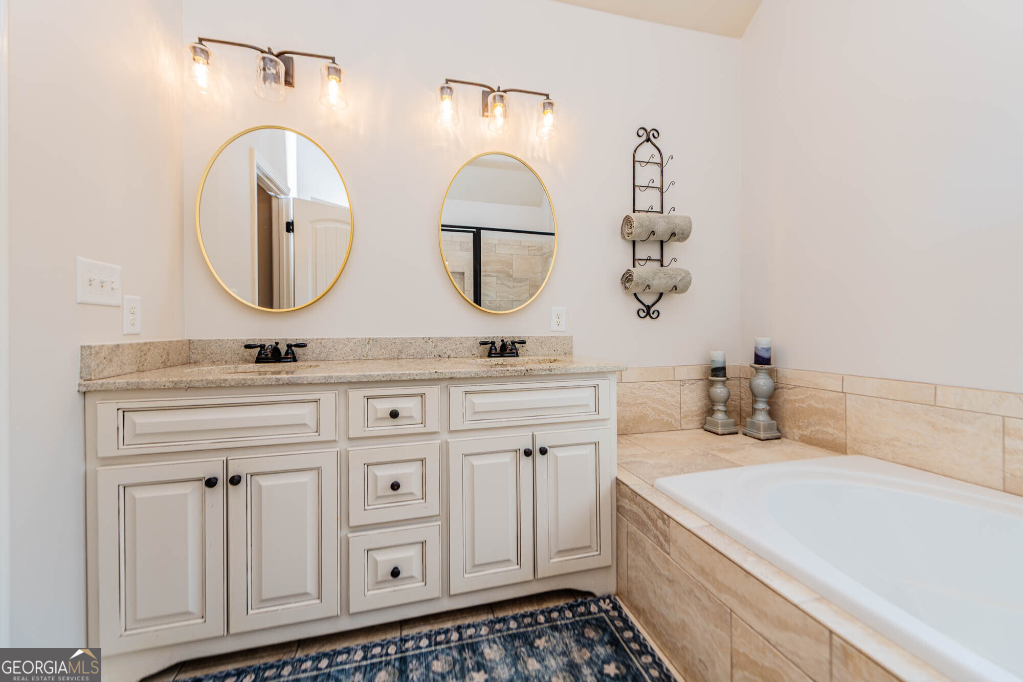 112 Bainbridge Lane Perry, GA 31069 - Photo 19 of 34 a bathroom with a double vanity sink and a mirror