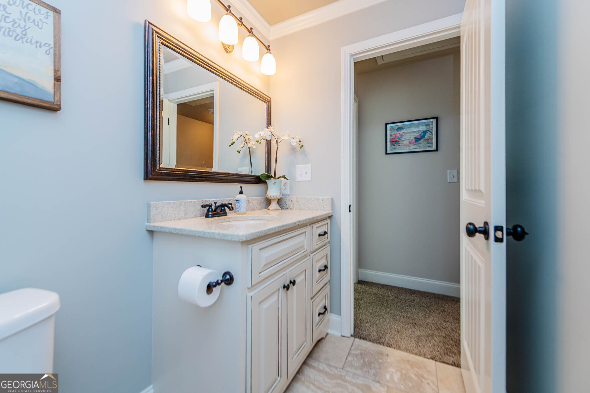 112 Bainbridge Lane Perry, GA 31069 - Photo 34 of 34 a bathroom with a sink and a mirror