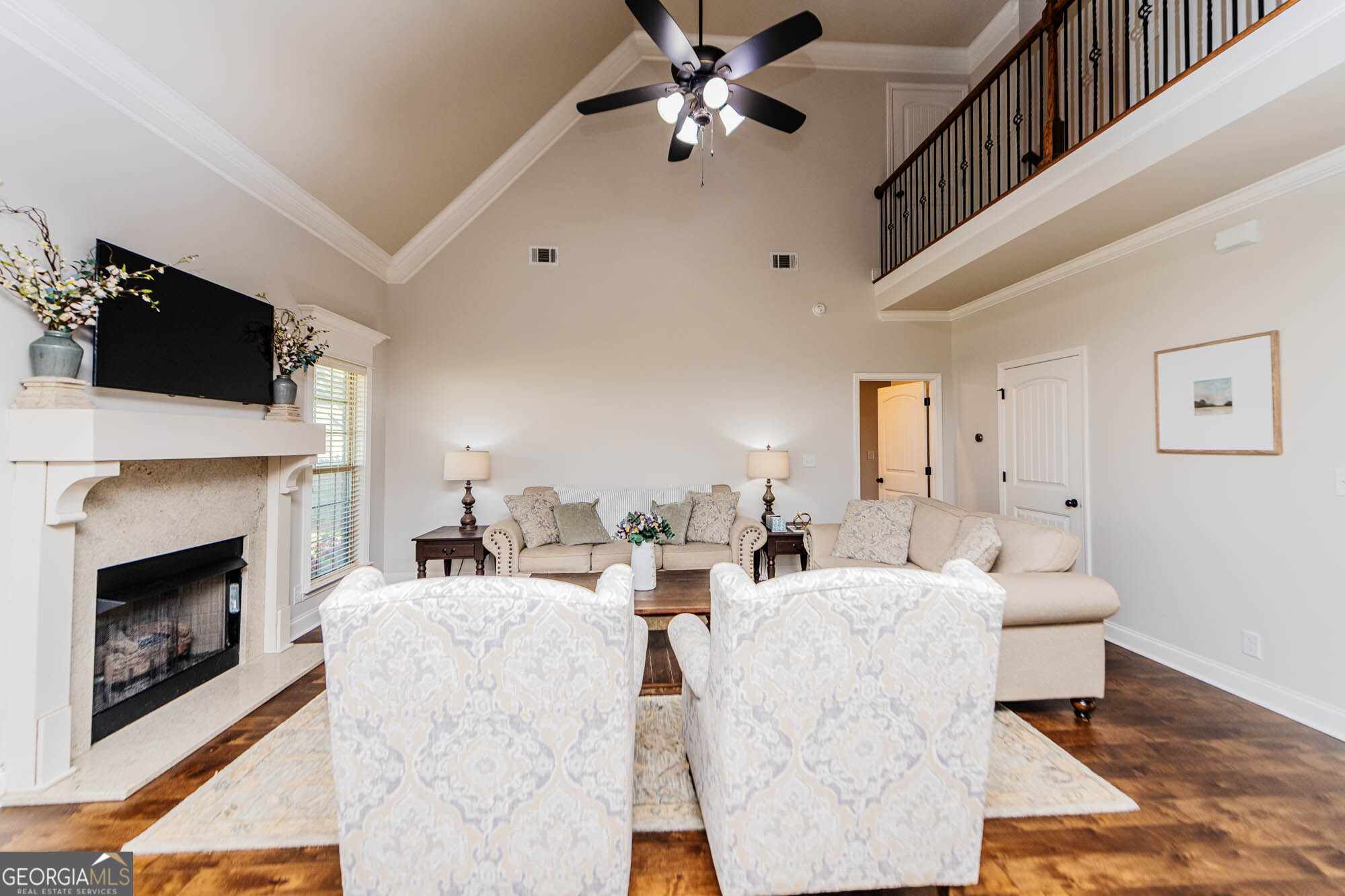 112 Bainbridge Lane Perry, GA 31069 - Photo 7 of 34 a living room with fireplace furniture and a flat screen tv