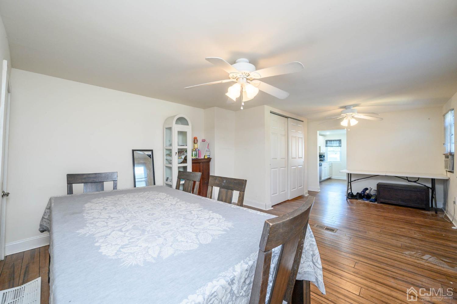 245 Washington Street Mount Holly, NJ 08060 - Photo 7 of 25 a bedroom with furniture and a wooden floor