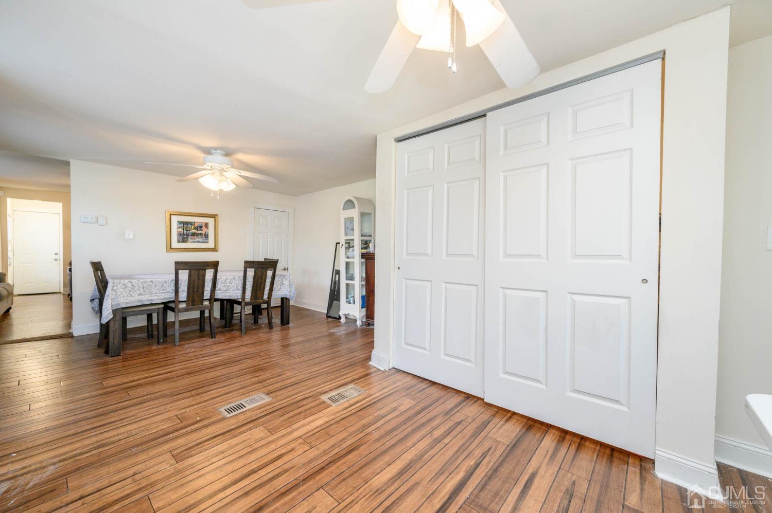 245 Washington Street Mount Holly, NJ 08060 - Photo 9 of 25 a view of a livingroom with furniture and wooden floor