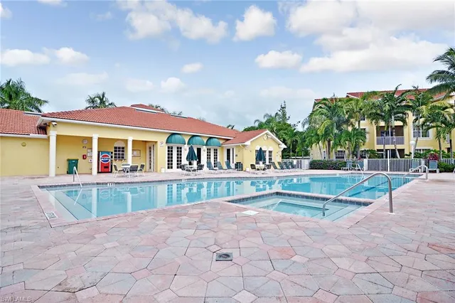 a view of house with outdoor space and sitting area