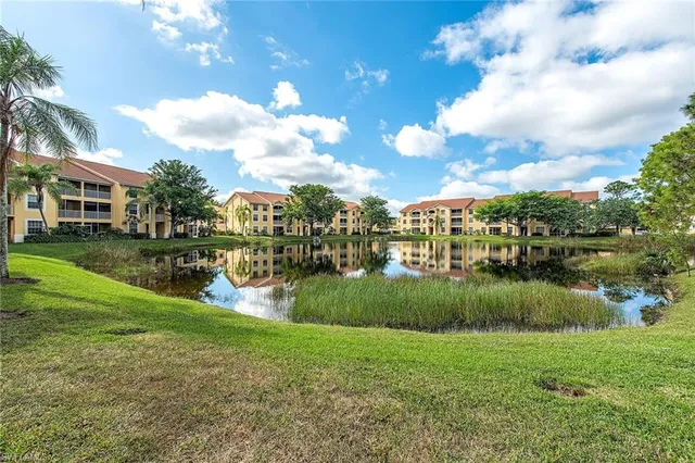 a view of a lake with a big yard