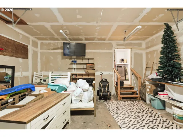 a bathroom with a shower and a mirror