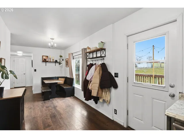 a view of a living room and dining room