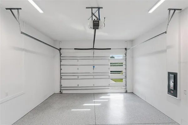 a view of a room with storage and utility room