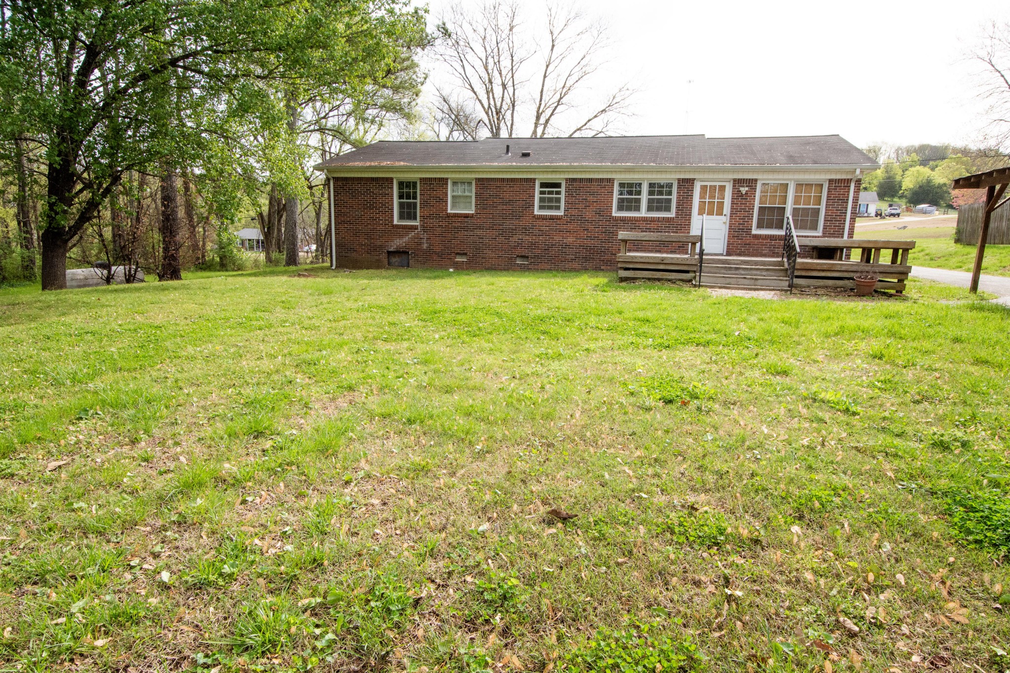 2012 Crescentview Road South Pulaski, TN 38478 - Photo 25 of 28 a front view of house with yard and green space