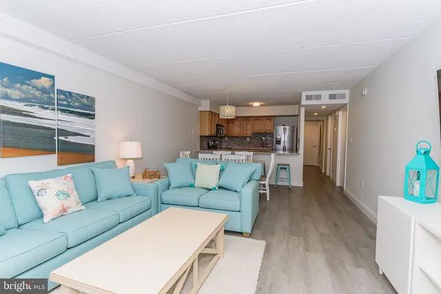 a view of a hallway with washer and dryer