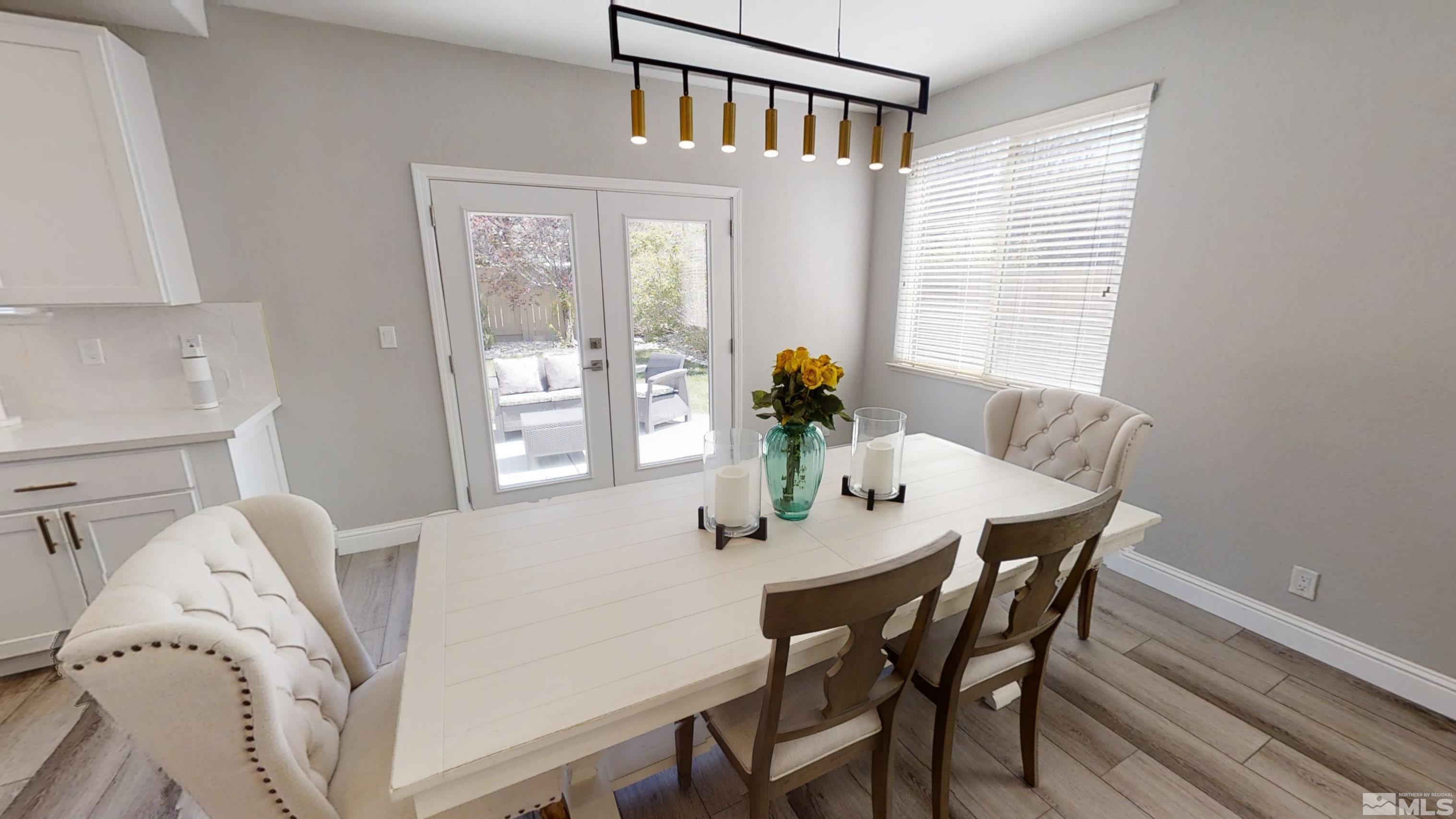 10018 Silver Star Drive Reno, NV 89521 - Photo 12 of 38 a view of a dining room with furniture and window
