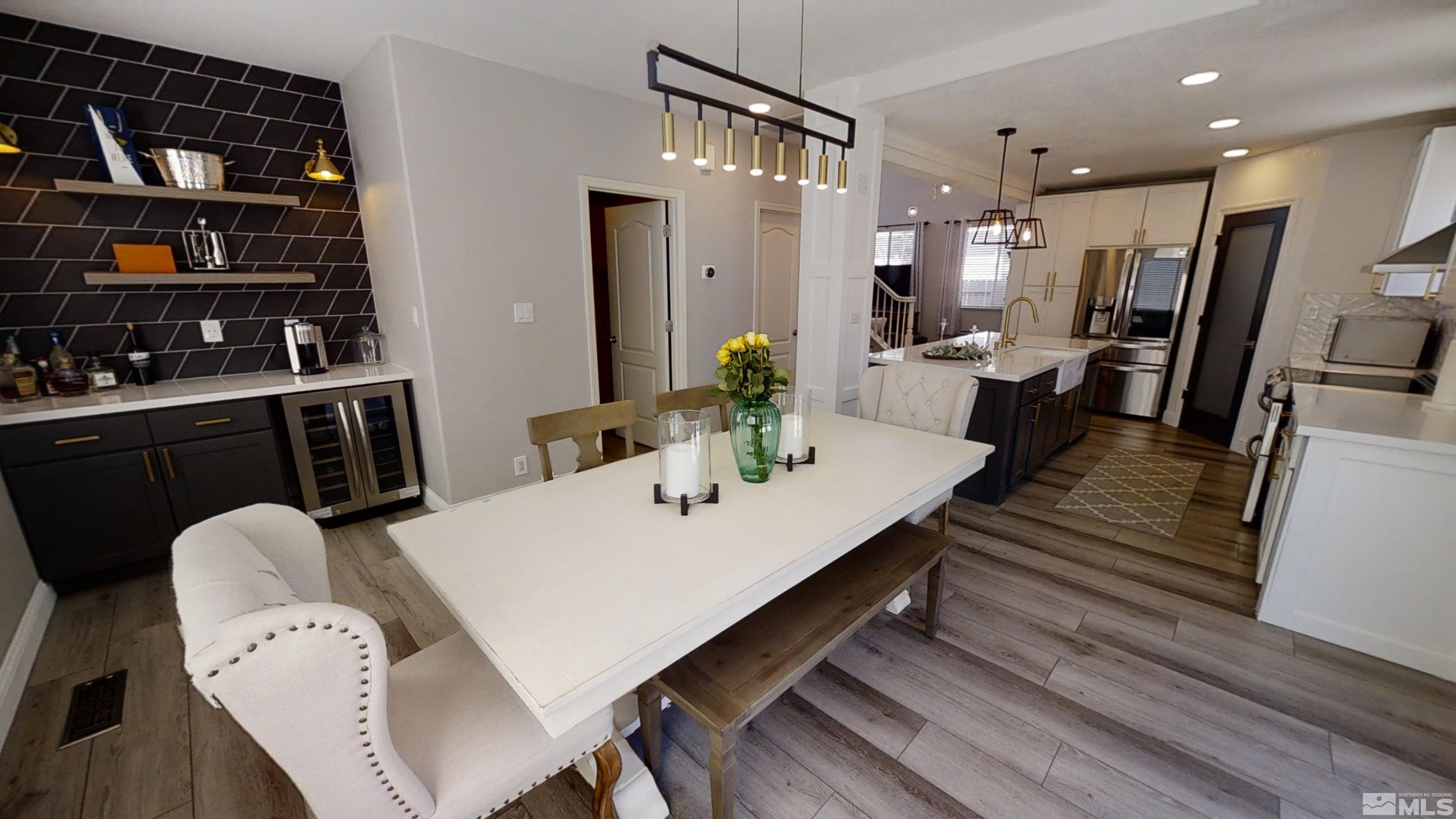 10018 Silver Star Drive Reno, NV 89521 - Photo 14 of 38 a large kitchen with a table and chairs