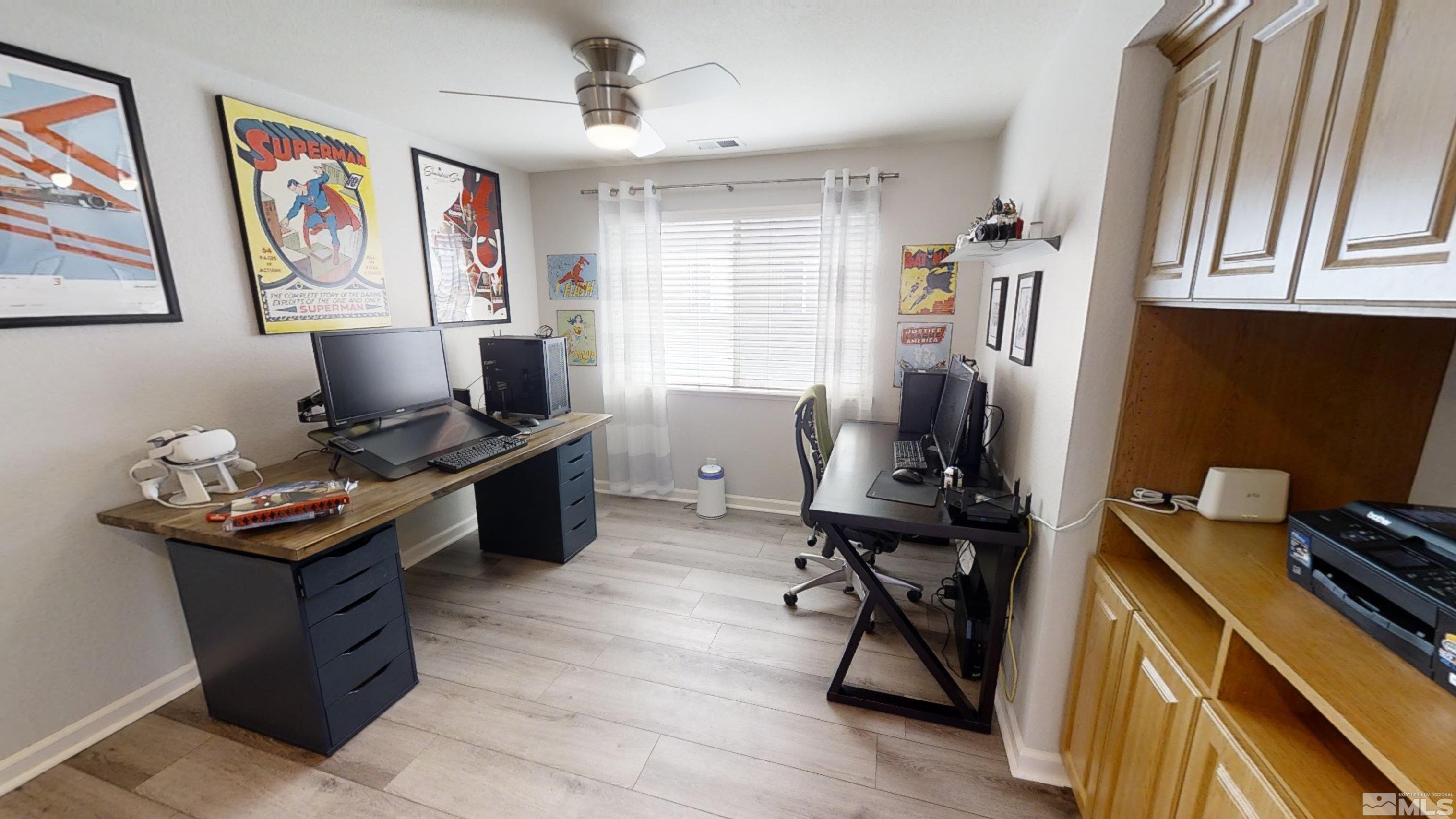 10018 Silver Star Drive Reno, NV 89521 - Photo 15 of 38 a view of a workspace with furniture and a window