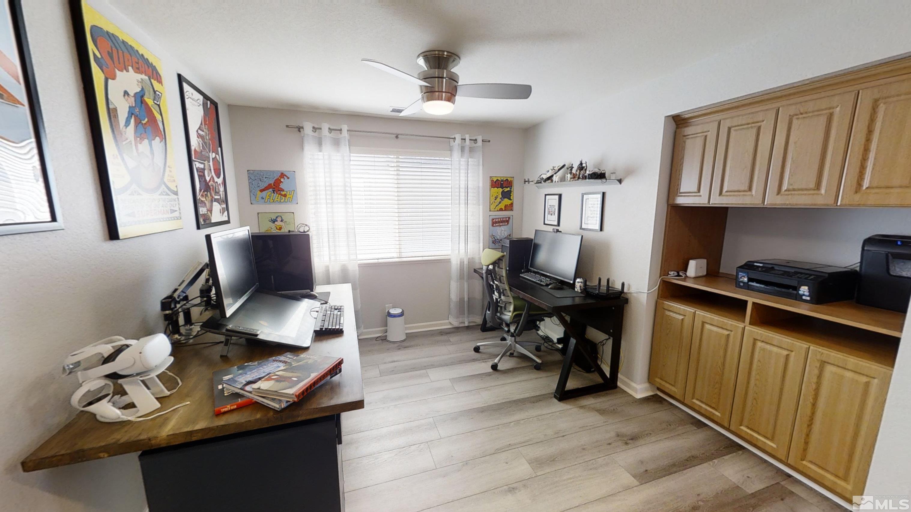 10018 Silver Star Drive Reno, NV 89521 - Photo 16 of 38 a view of a workspace with furniture and a window