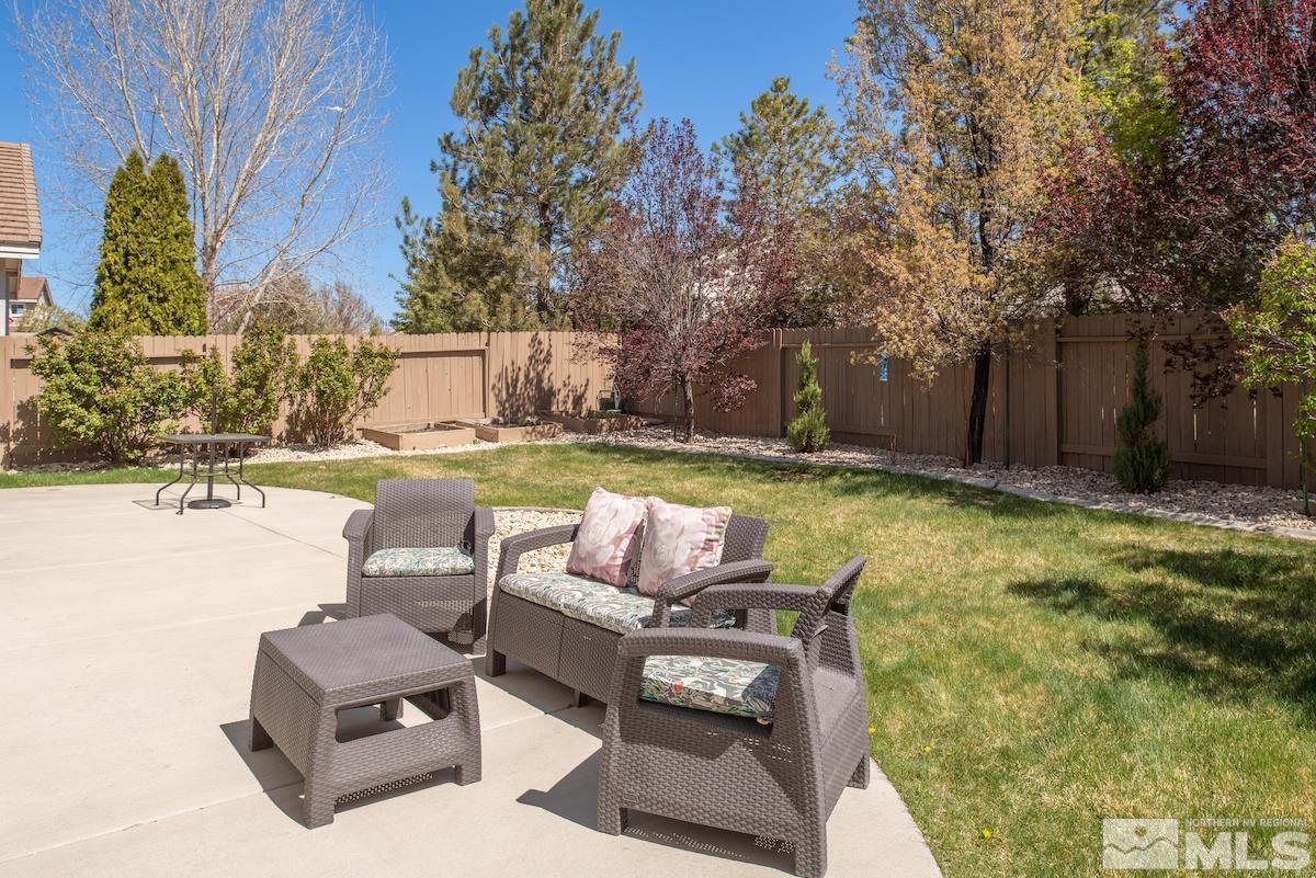 10018 Silver Star Drive Reno, NV 89521 - Photo 29 of 38 a view of backyard with outdoor seating