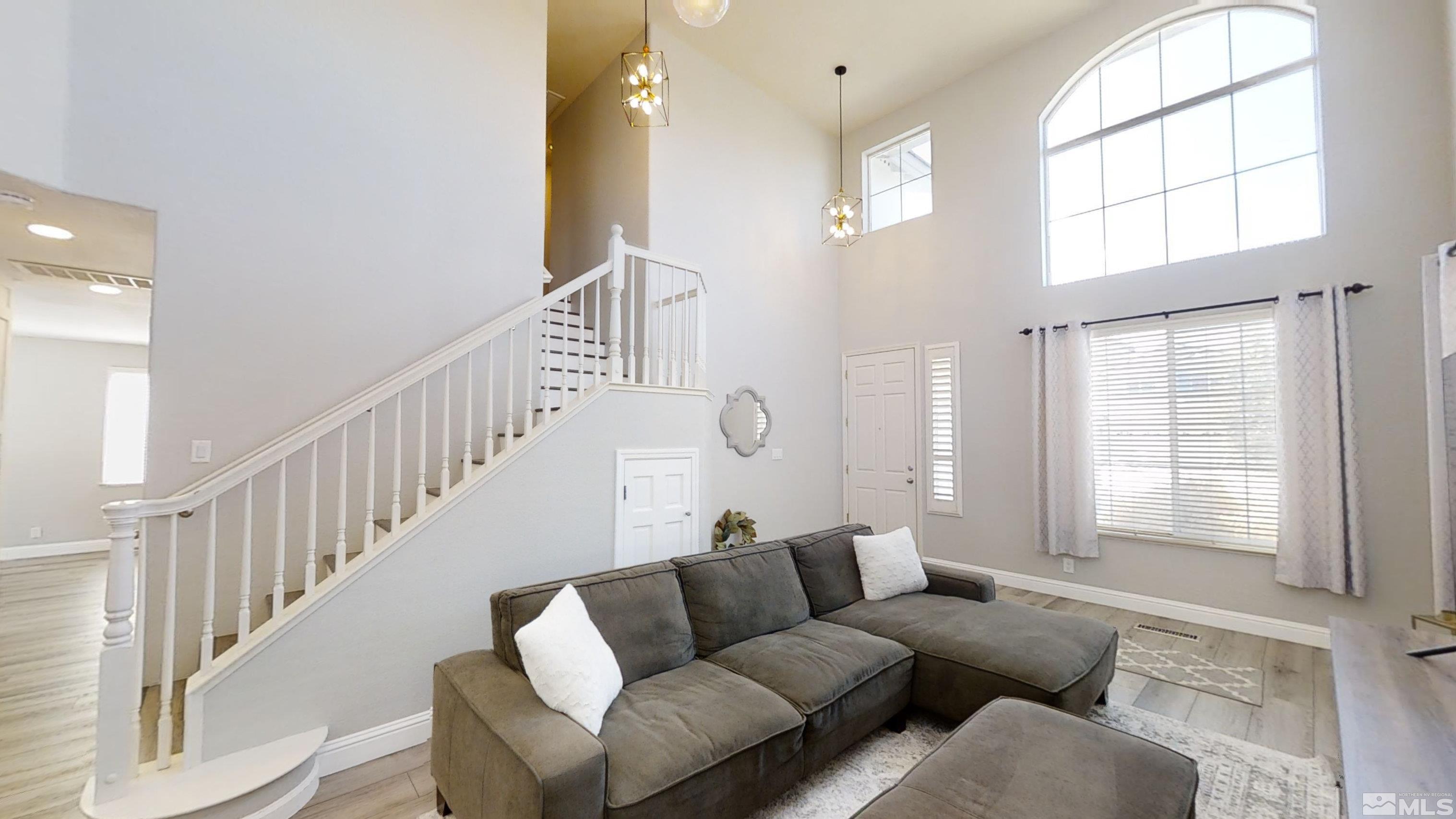 10018 Silver Star Drive Reno, NV 89521 - Photo 4 of 38 a living room with furniture and a window