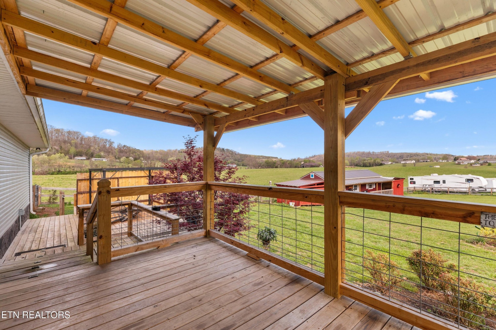 1159 Camellia Road Newport, TN 37821 - Photo 16 of 45 a view of a city from a balcony with furniture