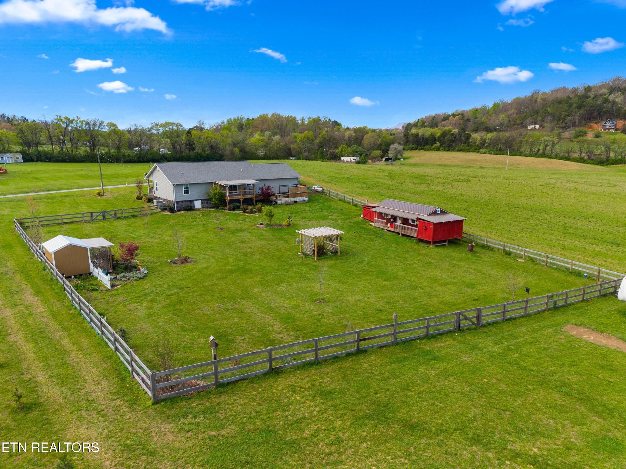 1159 Camellia Road Newport, TN 37821 - Photo 20 of 45 a view of a golf course with chairs