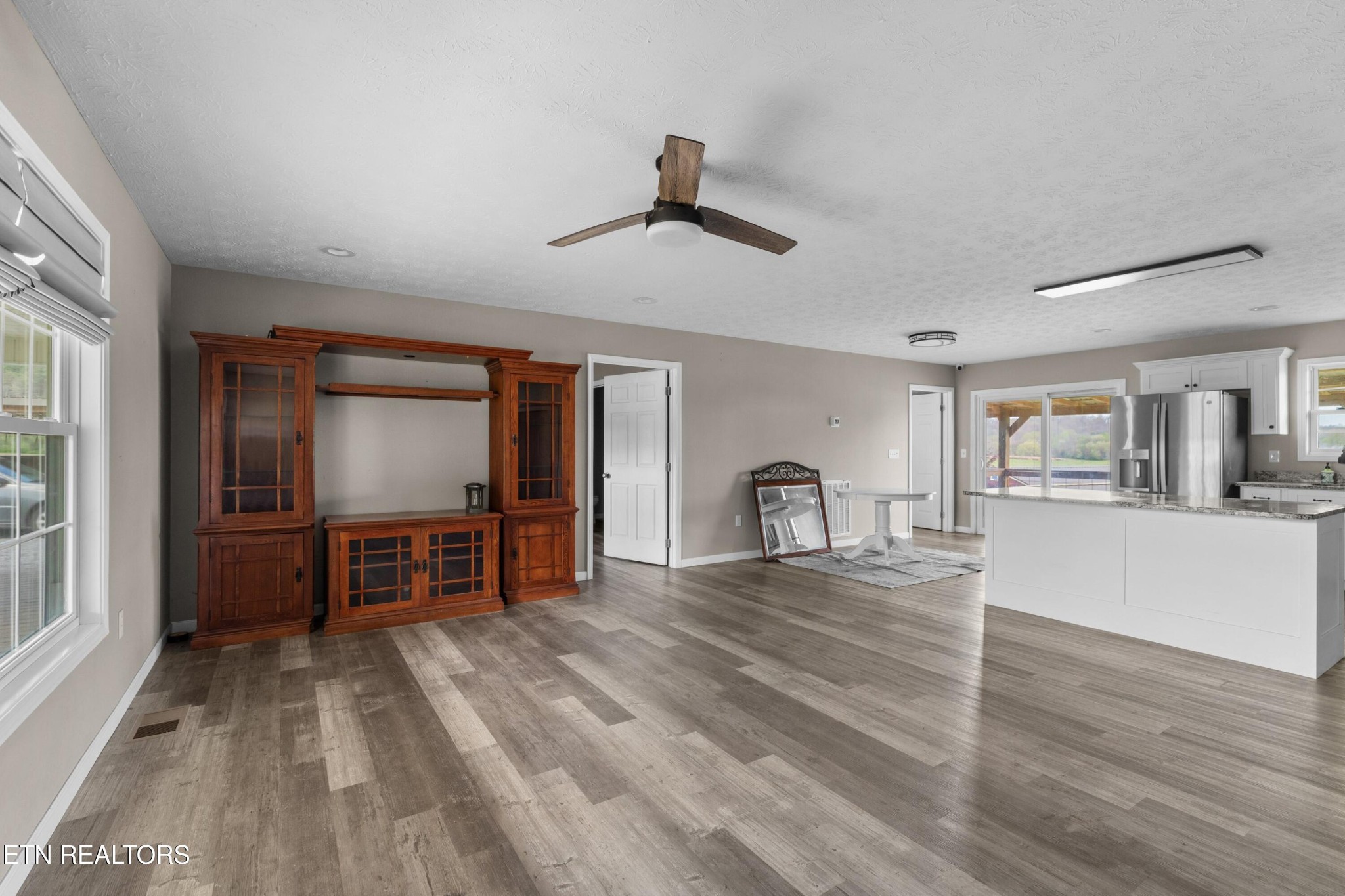1159 Camellia Road Newport, TN 37821 - Photo 24 of 45 a view of a livingroom with furniture window and wooden floor