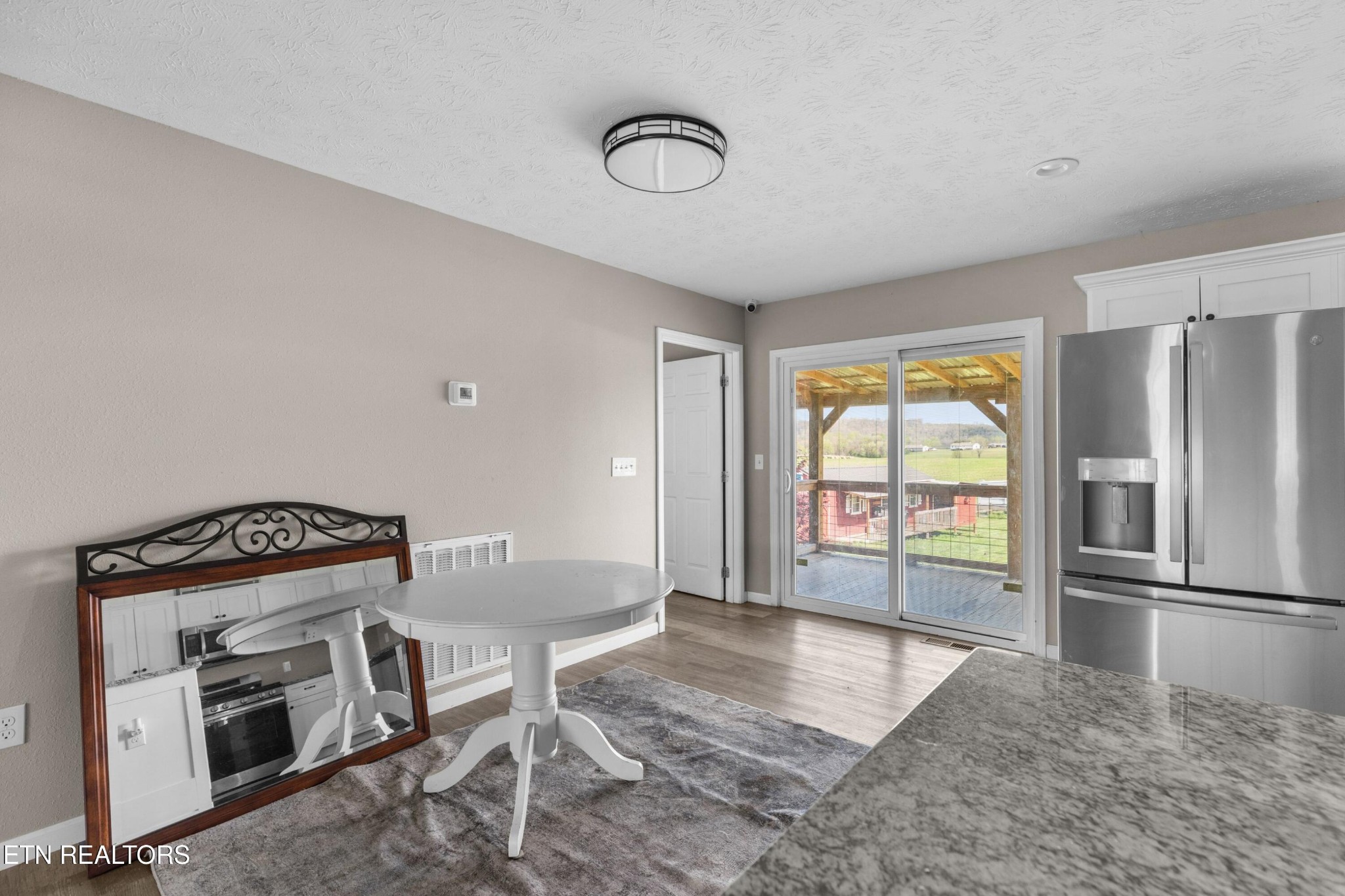1159 Camellia Road Newport, TN 37821 - Photo 32 of 45 a view of a kitchen with furniture and a fireplace