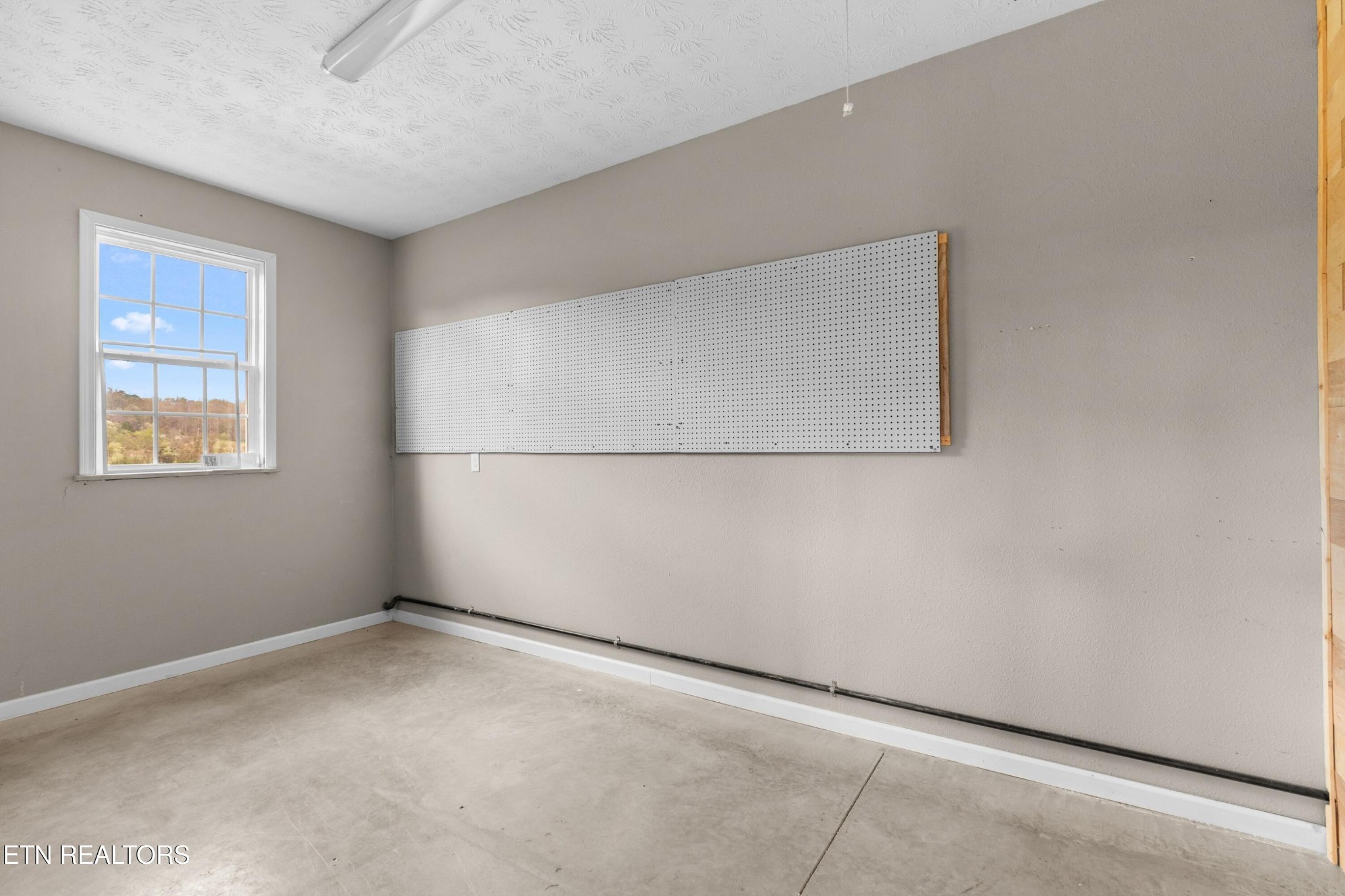 1159 Camellia Road Newport, TN 37821 - Photo 39 of 45 a view of an empty room with a window