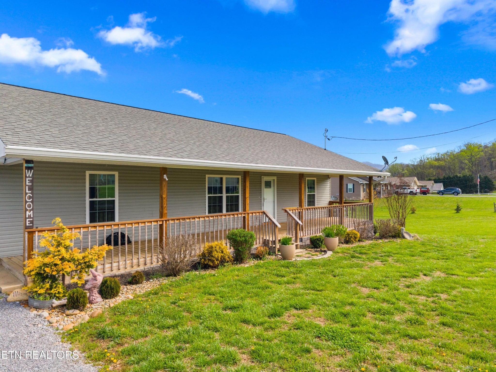 1159 Camellia Road Newport, TN 37821 - Photo 5 of 45 a front view of house with yard and seating area