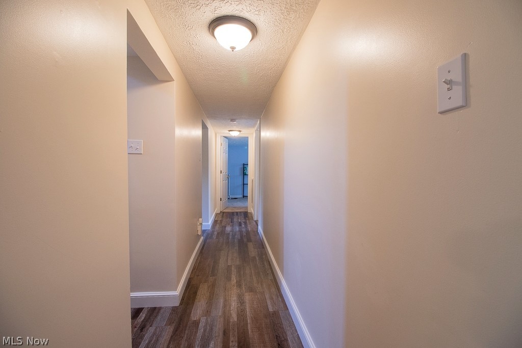 2982 Arcola Road Madison, OH 44057 - Photo 21 of 38 Lower Level Hallway