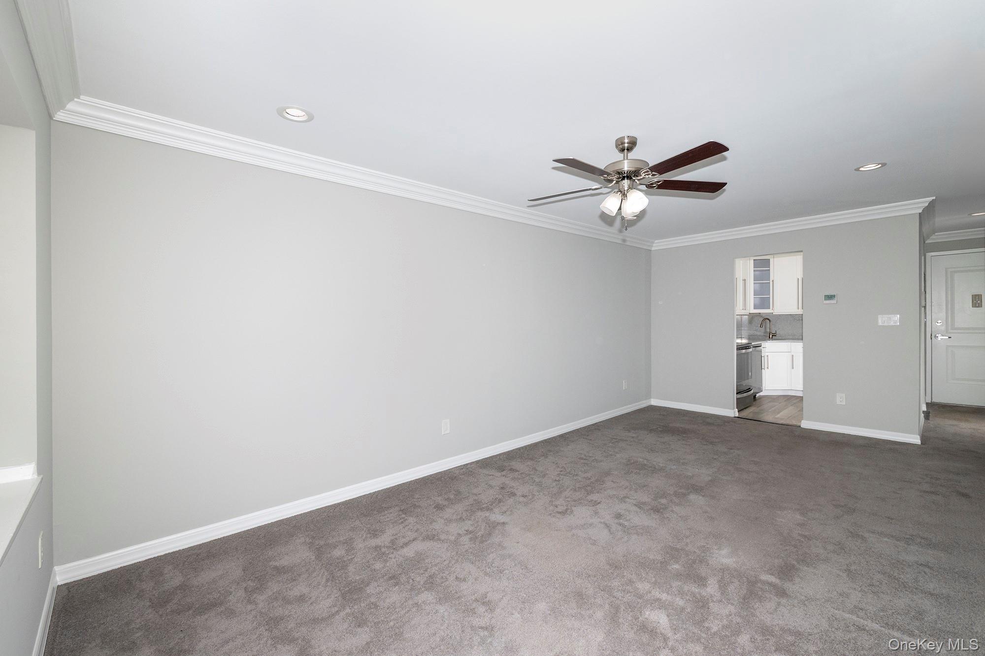 425 Newbridge Road, Unit 37 East Meadow, NY 11554 - Photo 4 of 8 a view of an empty room