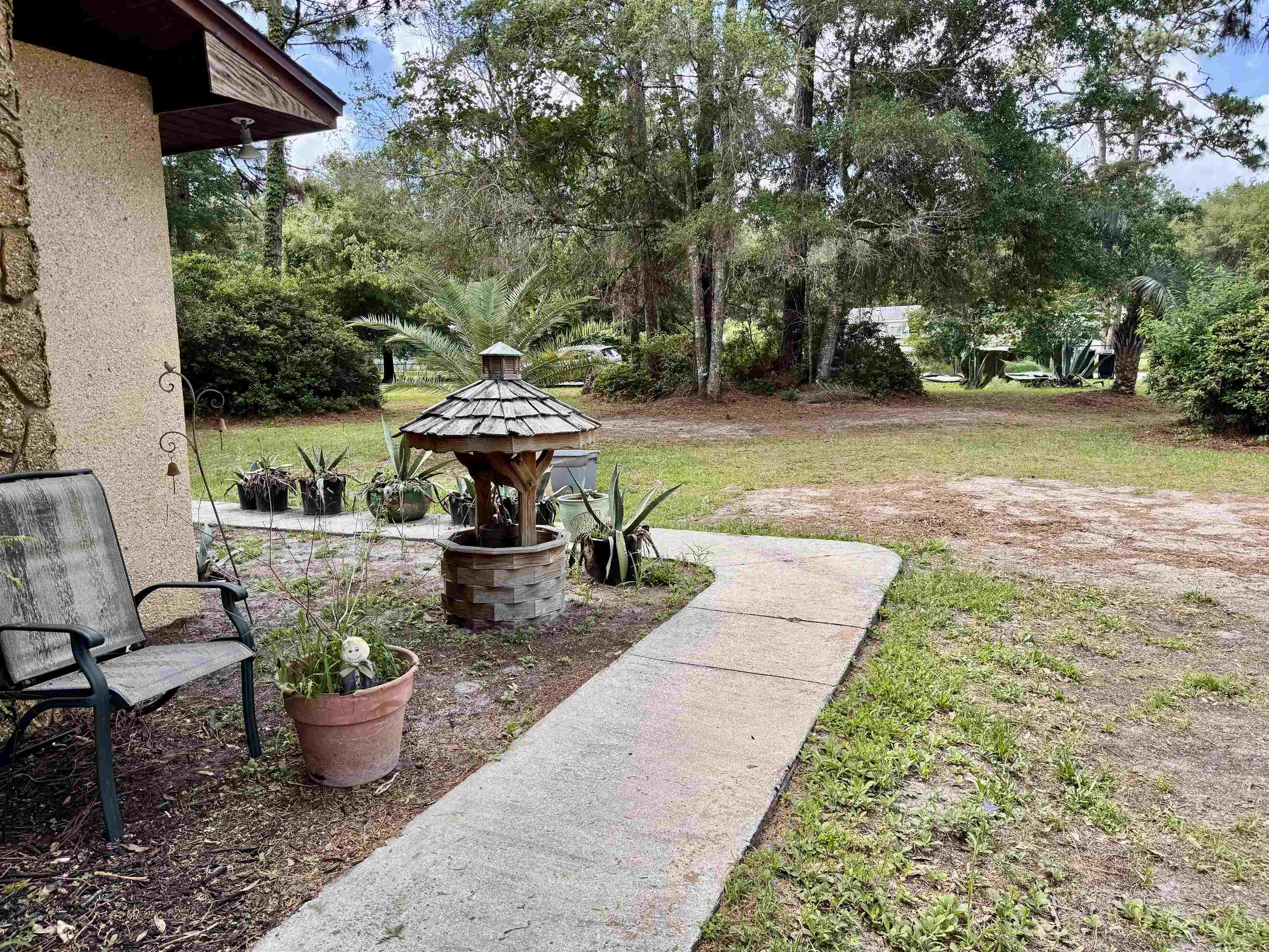 554 Hayley Road St. Augustine, FL 32086 - Photo 4 of 46 a view of a backyard with sitting area