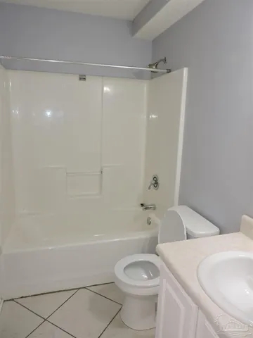 a bathroom with a sink a toilet and a bathtub