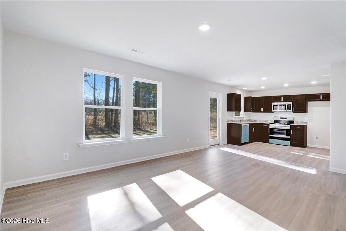 11379 Red Bud Road Castalia, NC 27816 - Photo 5 of 29 Stainless Steel appliances - the blue is the protective film