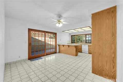 a spacious bedroom with a bed and a window