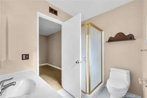 a bathroom with a toilet and a sink