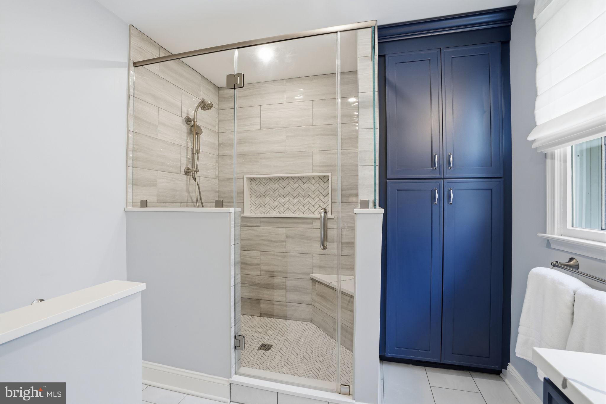 1431 Silo Road Yardley, PA 19067 - Photo 15 of 32 a bathroom with a glass shower door