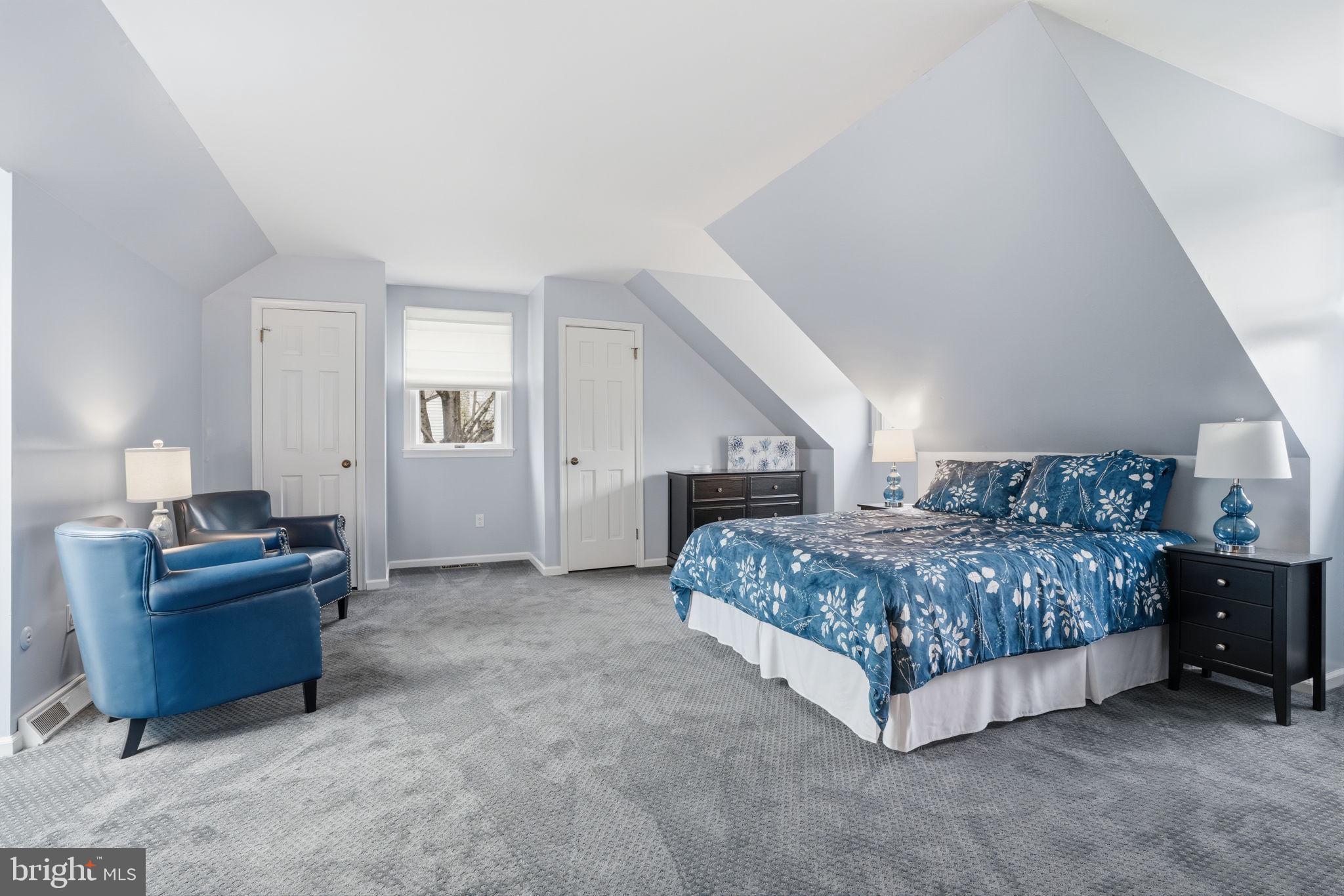 1431 Silo Road Yardley, PA 19067 - Photo 21 of 32 a bedroom with a bed and a couch