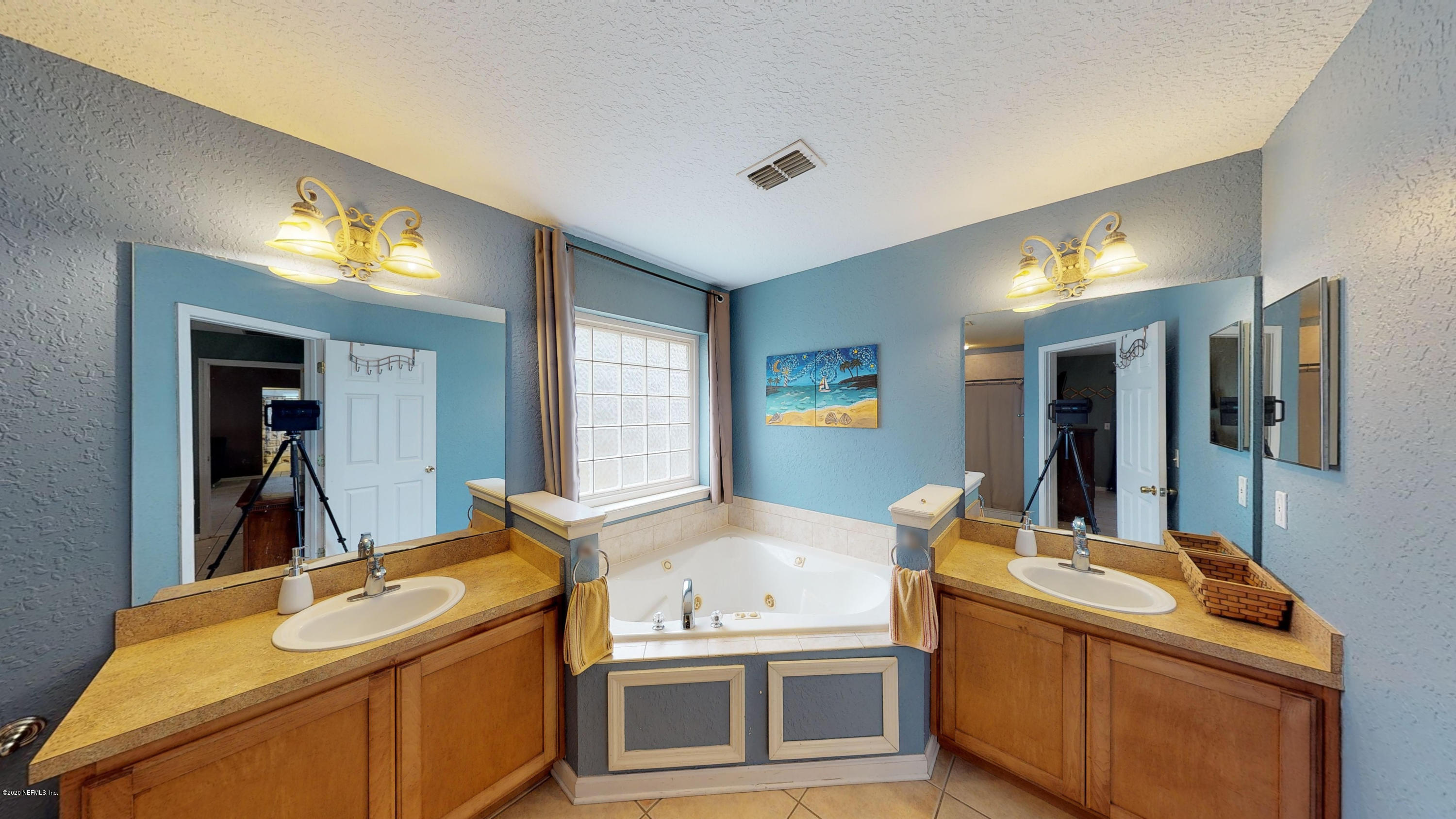3990 Bronco Road Middleburg, FL 32068 - Photo 18 of 40 a room with storage and utility