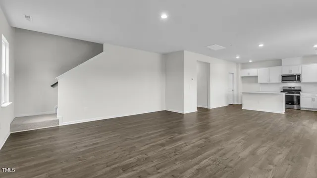 a view of kitchen with wooden floor