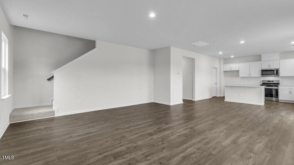 812 Comice Pear Way Willow Spring, NC 27592 - Photo 14 of 42 a view of kitchen with wooden floor