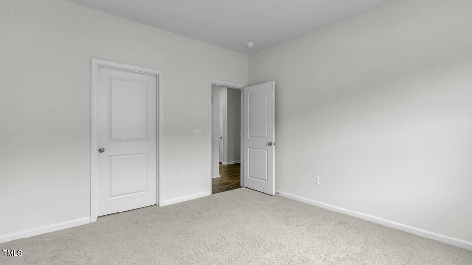 812 Comice Pear Way Willow Spring, NC 27592 - Photo 15 of 42 a view of an empty room