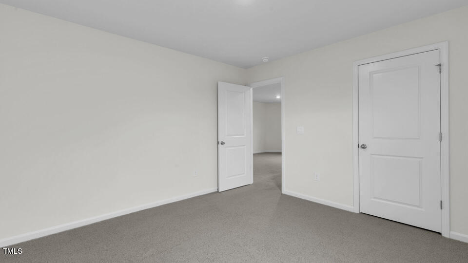 812 Comice Pear Way Willow Spring, NC 27592 - Photo 28 of 42 a view of an empty room