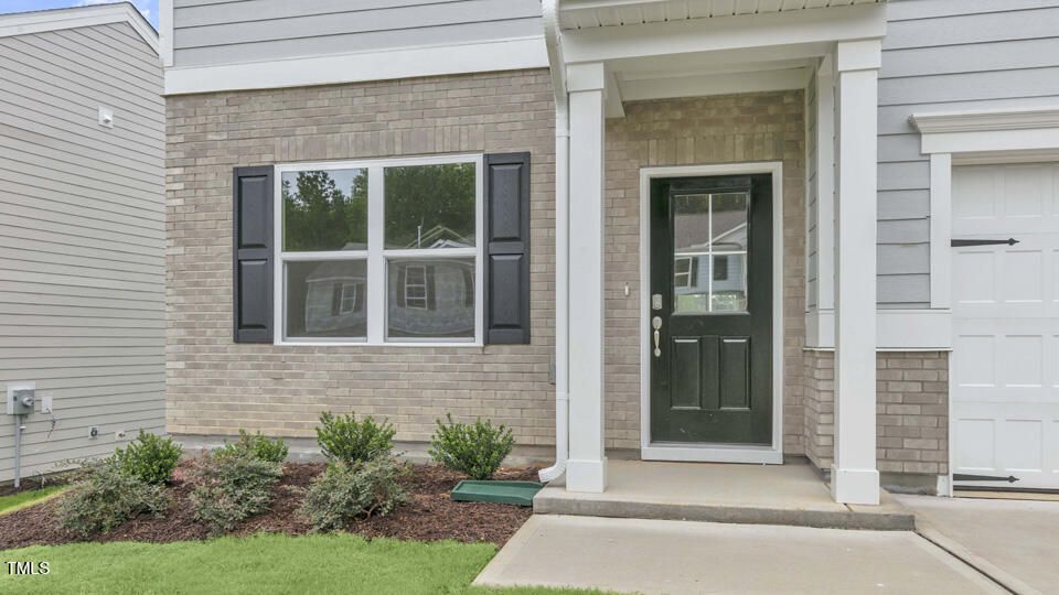 812 Comice Pear Way Willow Spring, NC 27592 - Photo 4 of 42 a view of entrance front of the house